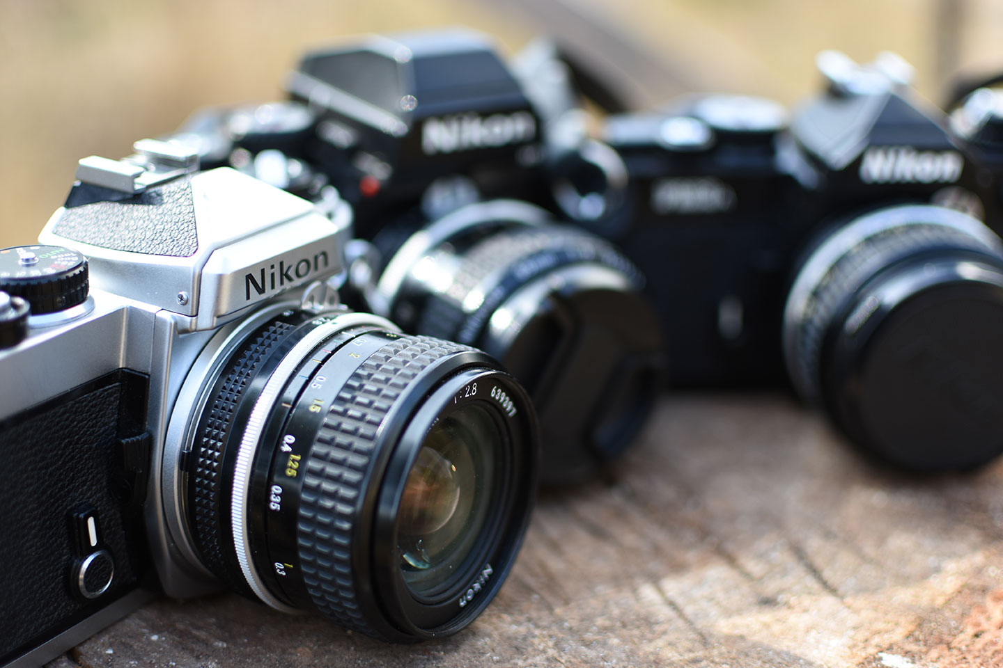 The Nikon FE, Nikon F3HP, and Nikon FM3A film cameras